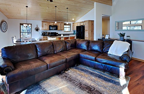 Chief Lake Cabin | Brand New 5 bedroom Lacourte Orellies lakefront home with covered deck and amazing lake views.