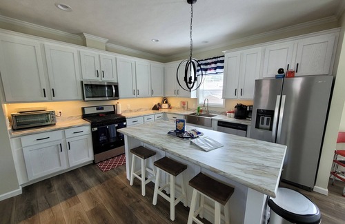 Lake Milton House | Brand new lake front house with private dock. Come visit the Loon's Nest