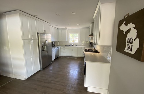 Coloma House | Brand new lakefront retreat on Paw Paw Lake with hot tub!
