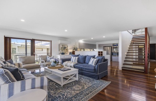 Emerald Beach Apartment | Breathtaking Views, Shared Pool and Yard, Steps from Beach