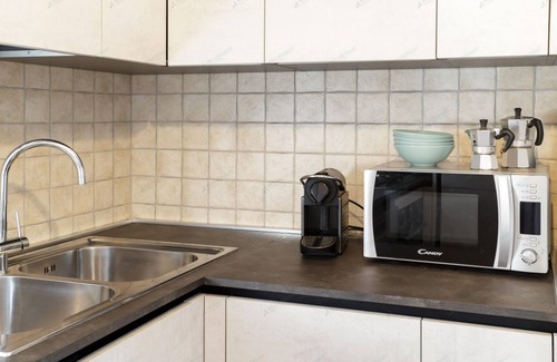 Paquier Apartment | Bright apartment in the town center with ski storage and communal parking.