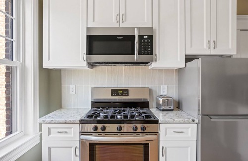 Cleveland Circle Apartment | Bright Brighton 1BR near T & Shops, by Blueground