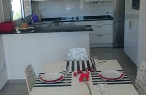Salir do Porto Apartment | Bright family apartment overlooking Sao Martinho Bay. Heated pool. Walk to beach