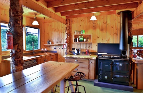 South Bruny Cabin | Bruny Island Lodge - Set amongst 860 acres of pristine bushland in remote South Bruny is The Lodge, a rustic timber chalet on the hill above Oyster Cove on Mickey’s Bay. The Lodge offers a unique experience on Bruny Island; it combines spectacular n