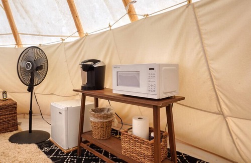 Hot Springs RV Rental | Buffalo Glamping Tipi with King Bed in Black Hills