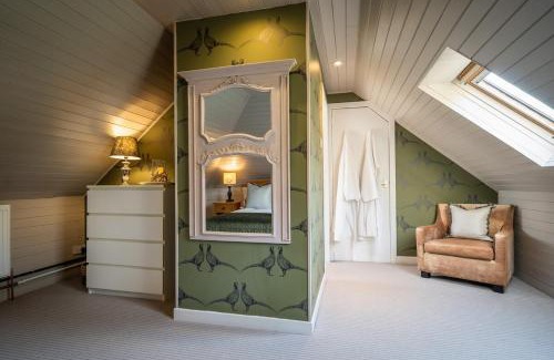 Port of Menteith House | Buzzard Cottage nestled in a hillside farm