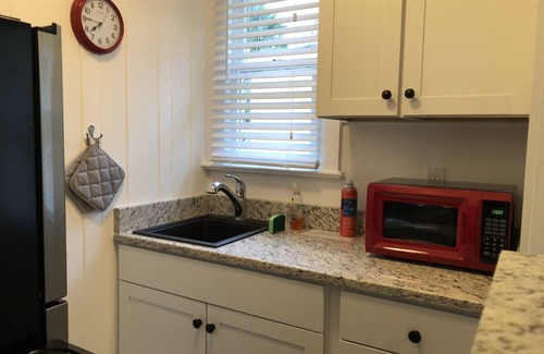 Downtown Historic District Apartment | C5, Flagler location in downtown, close to beaches, private patio, free parking!