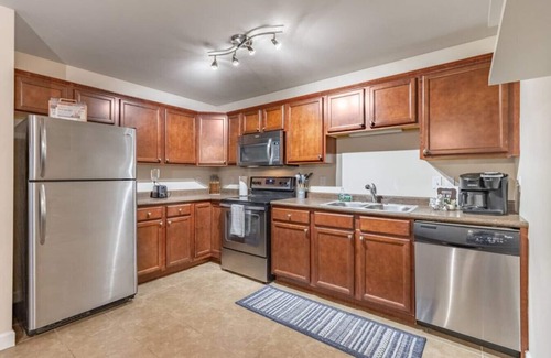 Orange Prairie Apartment | Camden 12B · ConTemporary Stay in Central Peoria