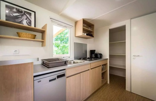 Brissac-Quince House | Camping de l'Etang Sites and Landscapes * - Privilege Cottage 2 ch. - TV - LV 6 people