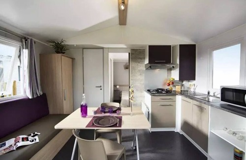 Brissac-Quince House | Camping de l'Etang Sites and Landscapes * - Privilege Cottage 1 ch. - TV 2 people