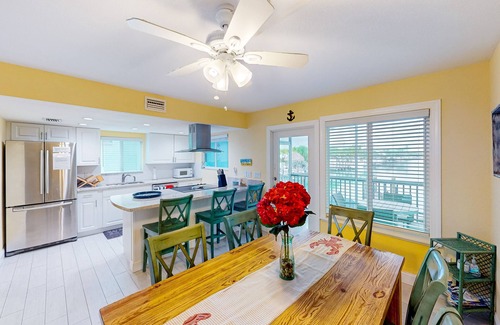 Key Colony Beach House | Canal-front duplex with Cabana Club membership, private dock, canal views, grill