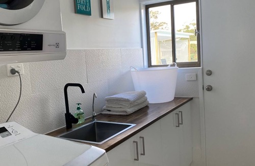 Port Macquarie House | Canal Waterfront Retreat Hosts 10 Pool & Spa