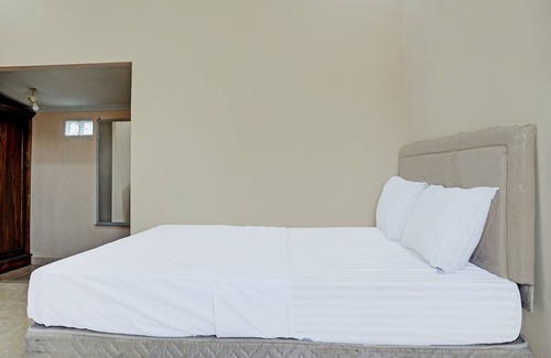 South Ogan Komering Ulu Hotel | Capital O 92316 Wisma Widya Loka Pratama Near Futsal Tebing Gading