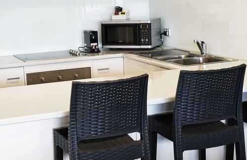 Paynesville Villa | Captains Cove Resort - Waterfront Apartment