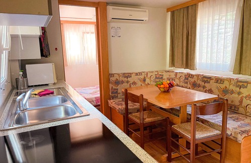 Palazzuolo sul Senio RV Rental | Caravan "Le Sorgenti - Mobile Home 46" with Mountain View, Private Garden & A/C