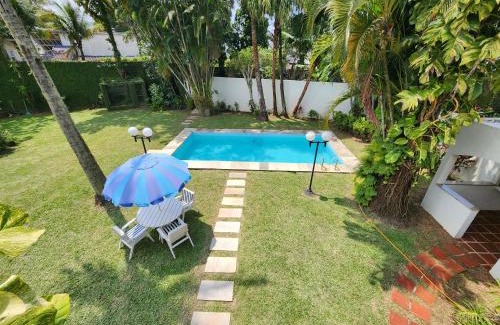 Jardim Virginia House | Casa Enseada 4 suites , 2 quadras do mar local nobre