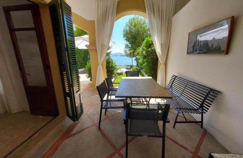 Puerto de Pollensa Apartment | CASA FARO Spacious, Ground Floor Property on the Pine Walk, Covered terrace with Sea Views. Wifi/Air Con