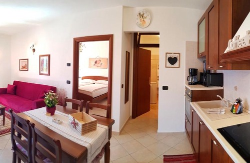 Voltino Apartment | Casa Palanca 2 balcony lake view By Garda Domus Mea