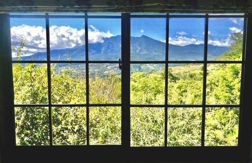Jaramillo Cottage | Casita with stunning view of Volcano Baru, lush tropical gardens, above Boquete