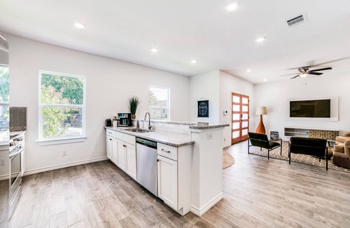 Uptown House | CENTRALLY LOCATEDt! NEW ONE-STORY HOME near downtown. “Horace Whispers”