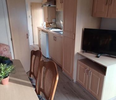 Schoonloo Ski Chalet | Chalet 108 met airco familie camping de Tien Heugten Schoonloo Drenthe