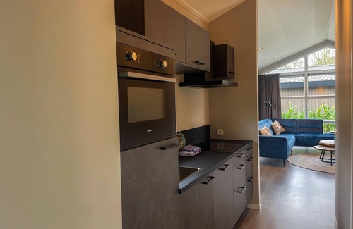 Municipality of Veldhoven Ski Chalet | Chalet by Park Pond in the Netherlands
