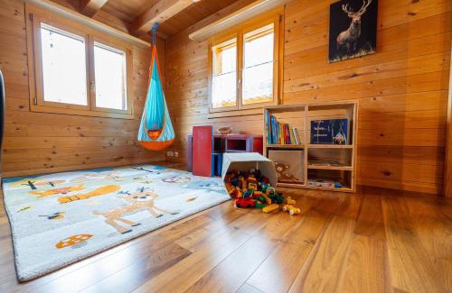 Leukerbad Apartment | Chalet Regenbogen Leukerbad mit Indoorrutschbahn