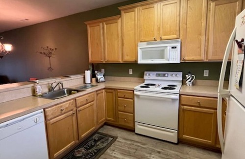 Historic District Condo | Charming 2 Bedroom/2 Bath Condo with Screened in Porch Villages at Five Points
