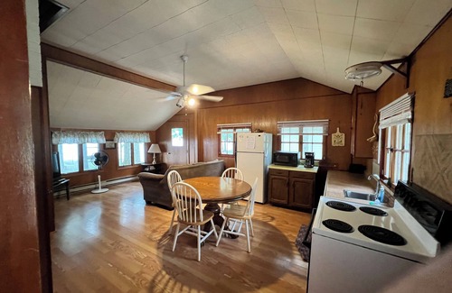 Herron Cabin | Charming 2-bedroom cabin sits on 2.5 acres on Hubbard Lake.