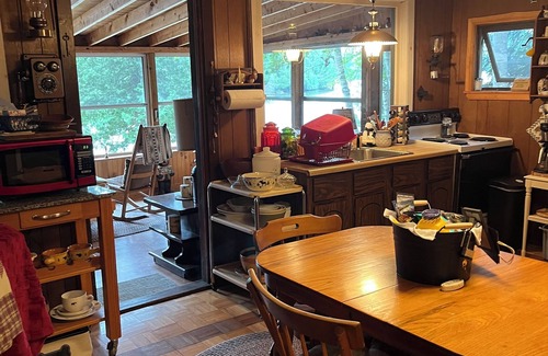 Saranac Lake Cabin | Charming 2-bedroom cabin on the water! Featuring boathouse and dock Saranac Lake