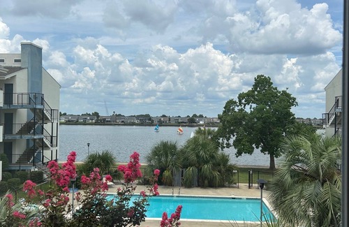 Slidell Condo | Charming 2Bd. waterfront living, pool, fitness rm. in serene Slidell