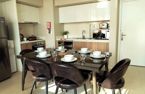 Muharraq Apartment | Charming 2BR apartment, beach access and pool view, ideal for extended stays.