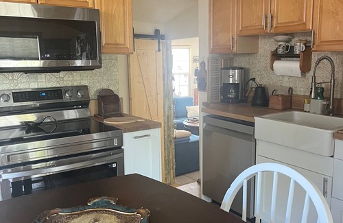 Shore Acres House | Charming 2BR house with a Swimming Pool and a Garden.
