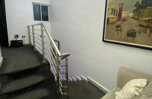 Ojodu Apartment | Charming 3-bedroom duplex in welcoming on wempco road Ikeja lagos with WiFi, AC