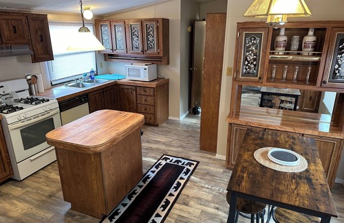 Navajo Dam House | Charming 3-bedroom home on San Juan River, access to river within feet of door.