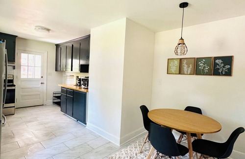 Wilson House | Charming 3-bedroom house just minutes from DT Wilson. Enjoy a comfortable stay!