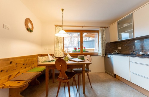 Santa Valburga Apartment | Charming Apartment “Panorama Raffeinhof” with Lake View, Balcony, Terrace & Garden