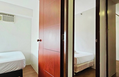 Valencia Hotel | Charming & Cozy 3-bedroom with WiFi in Quezon City
