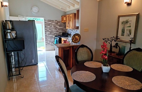 Falmouth House | Charming, cozy and comfortable home away from home in a tranquil neighborhood.n