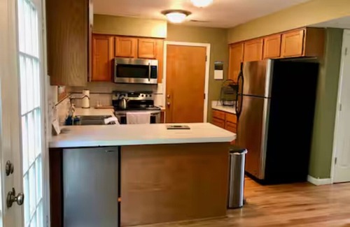 Lawrence House | Charming family friendly 4-bedroom house with AC, WiFi in fabulous Lawrence.