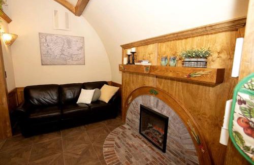 Springvale House | Charming Luxury Hobbit House with Private Hot Tub in Tranquil Woodlands on Littlefield Pond in Springvale, Maine