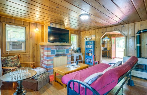 Herron House | Charming Michigan Cottage with Sunroom and Lake Access