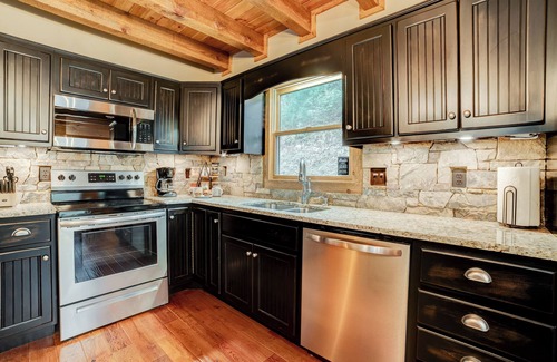Ellijay Cabin | Charming Riverfront Cabin for 14 – Hot Tub, Game Room & Christmas Decorations!