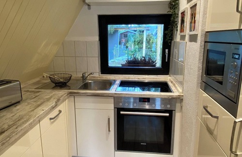 Schneverdingen House | Charming roof-only house in quiet surroundings