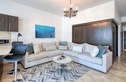 Libertad Apartment | Charming & sunlit condo with pool & balcony - near golf, beaches, & nightlife