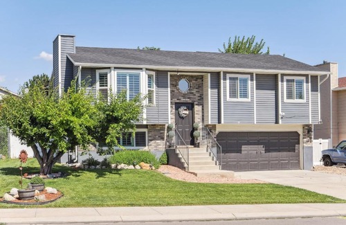 West Jordan House | Charming Utah Getaway with Fire Pit and Furnished Deck