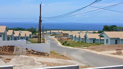Discovery Bay Villa | Chic 2BDR Oceanview Escape, Pool & Beach Access