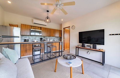 P Chahue Condo | Chic Central Living: 1-Bedroom Condo Rental in Prime Location