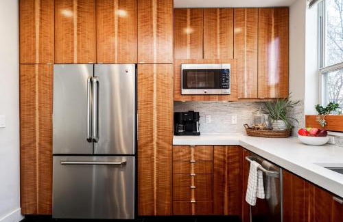 City Park West House | Chic City Park Home - Rooftop Deck - Skyline Views
