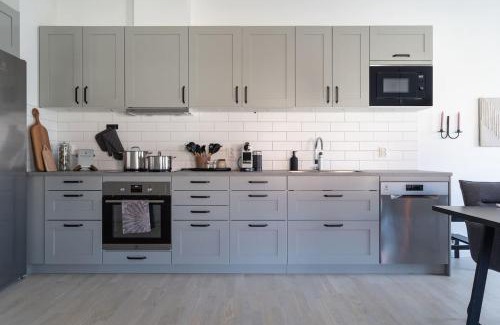 Bastad House | Chocolaty Warmth Home 3BR Flat with Cozy Balcony